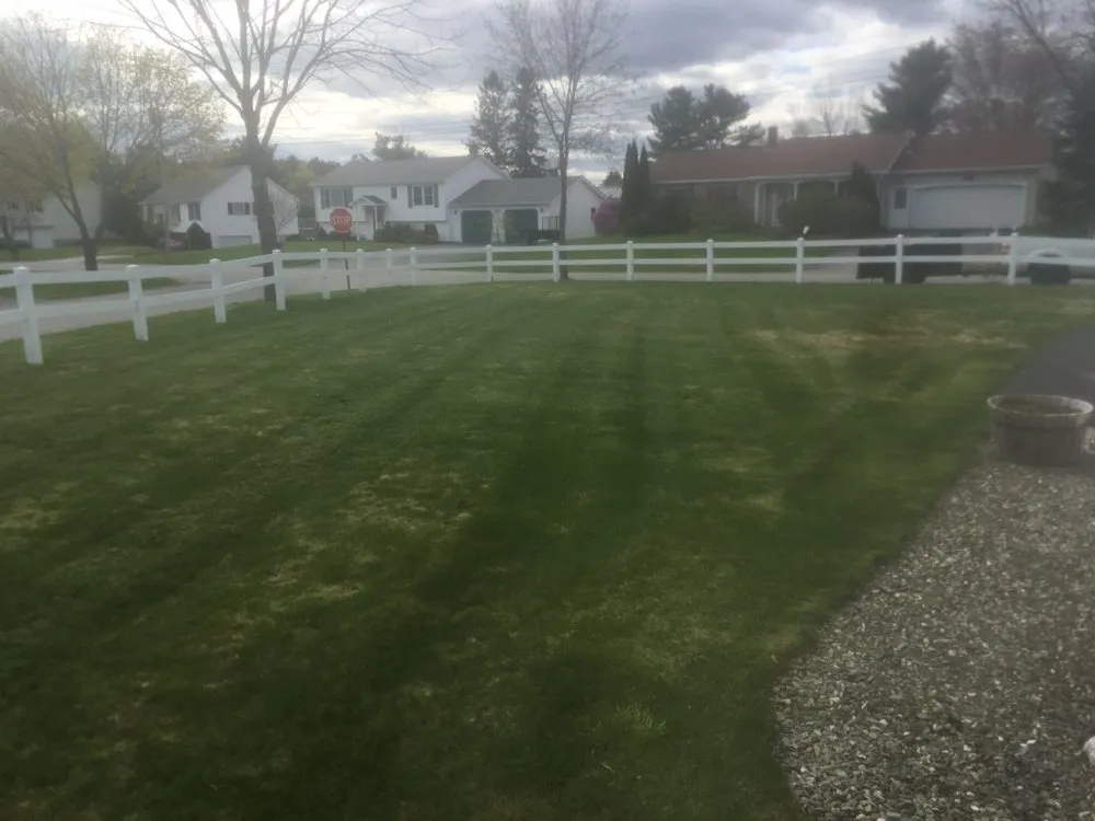 Top-rated lawn care service in Bangor, ME by T & T Property Services