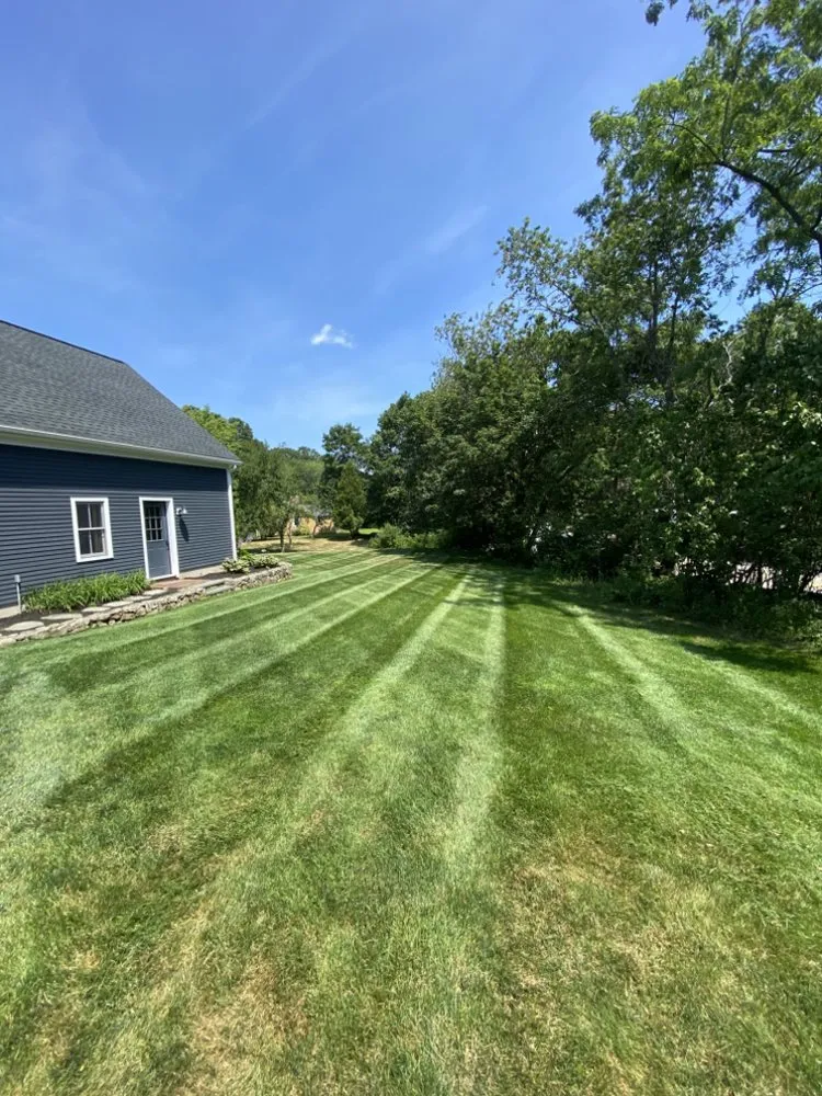 Custom landscape installation for residential properties across Sanford, ME - T & T