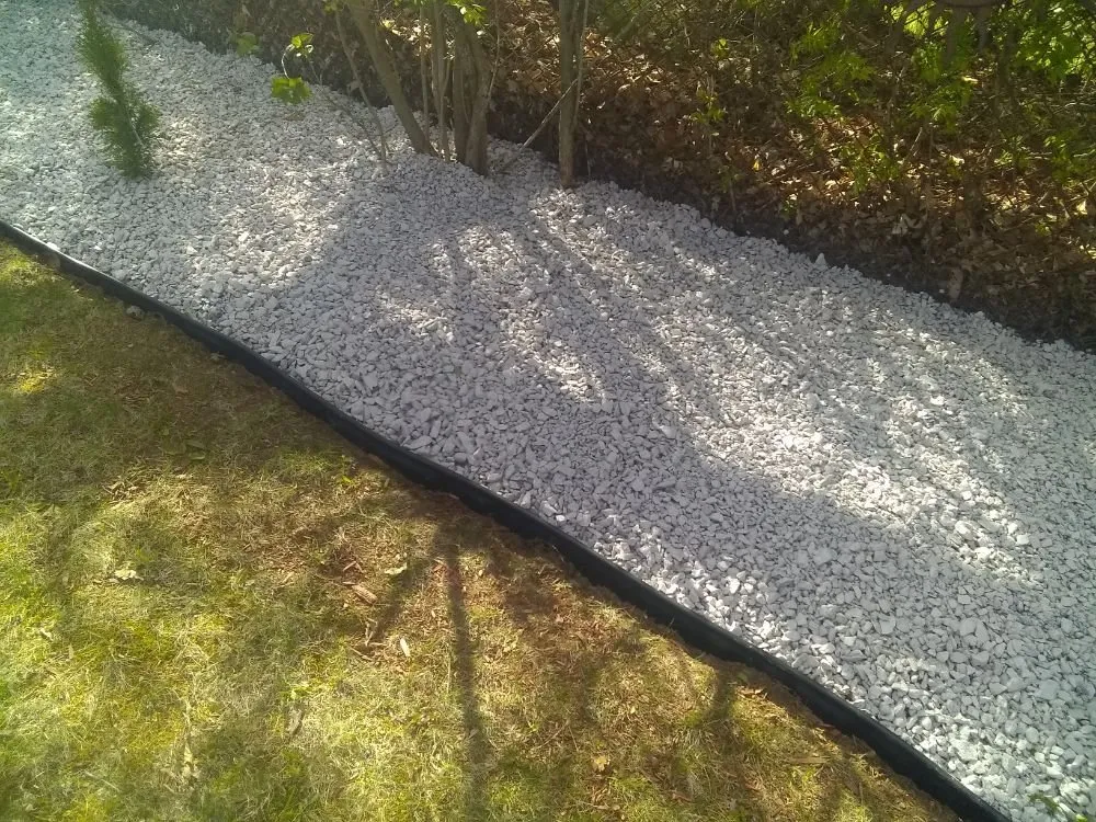 Custom yard cleanup service for year-round maintenance in Brookfield, MA by T A Services Lawn Care and Design