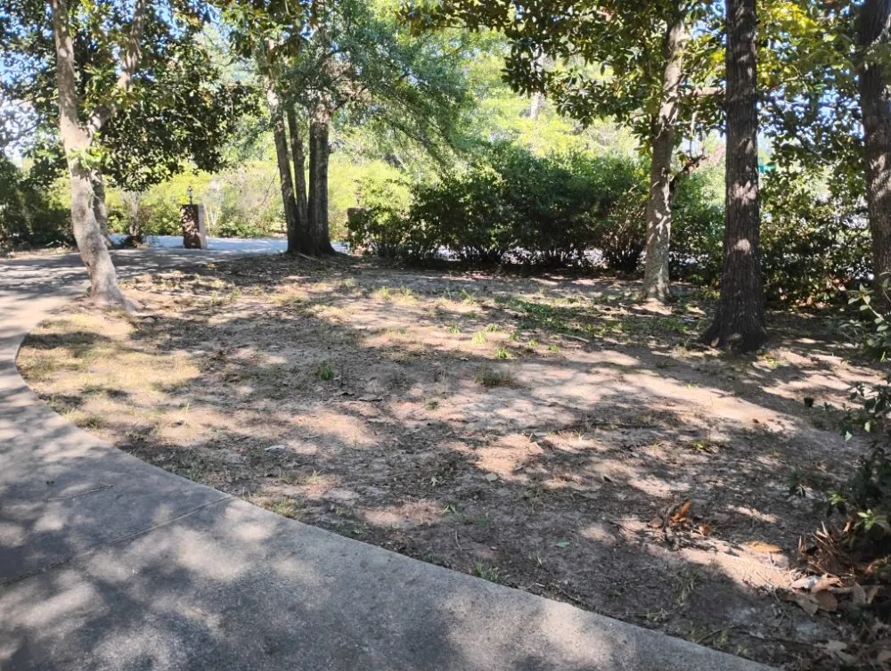 Custom garden landscaping with custom design in Gulfport, MS by T And A Working Miracles Lawn Care