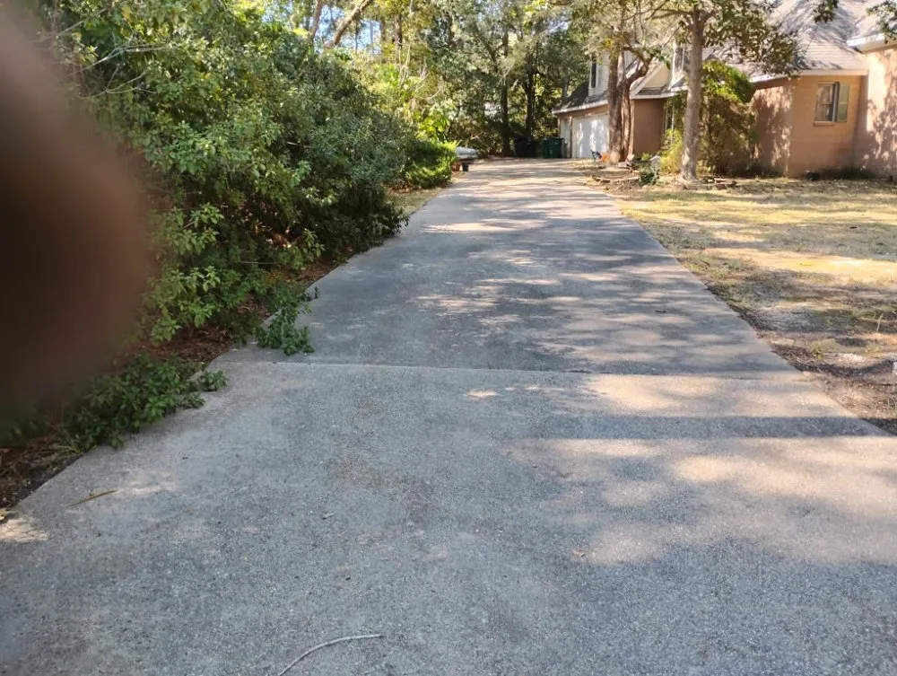 Custom lawn mowing service for residential properties in Gulfport, MS by T And A Working Miracles Lawn Care