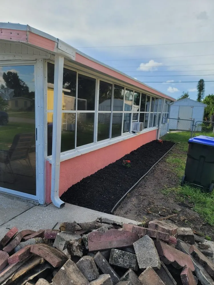 Custom lawn mowing service for outdoor upgrades across Port Charlotte, FL - T Bro Outdoor Renovation