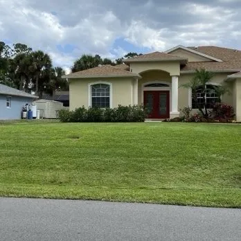 Affordable landscape installation with custom design in Port Charlotte, FL by T Bro Outdoor Renovation