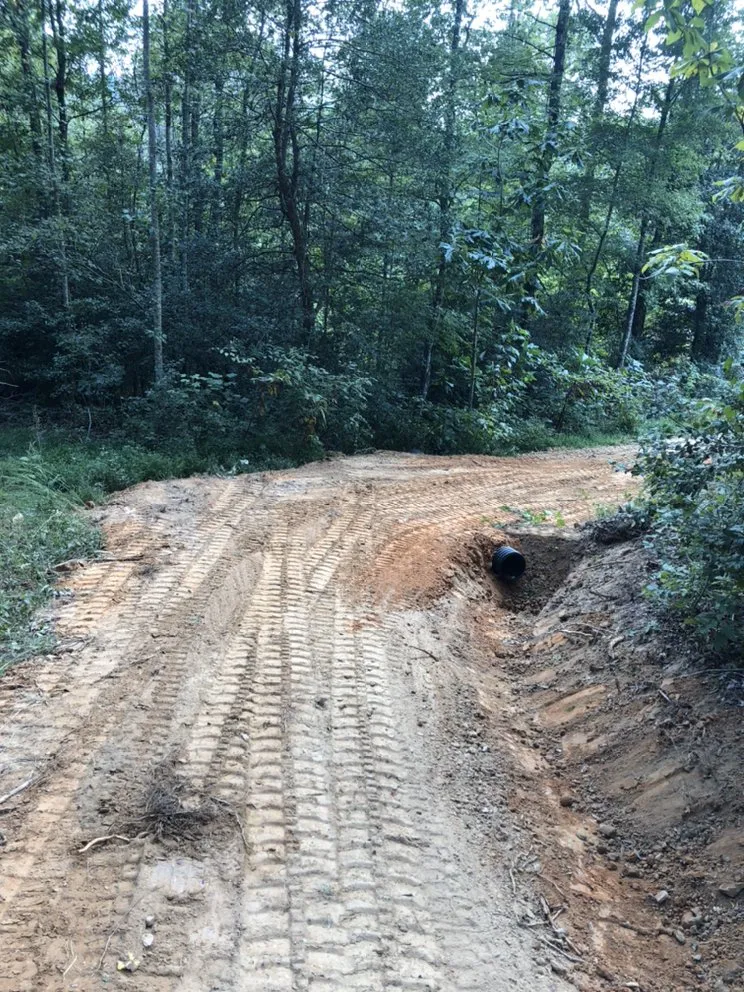 Local landscape installation with custom design across Moravian Falls, NC - T. Greene Excavation