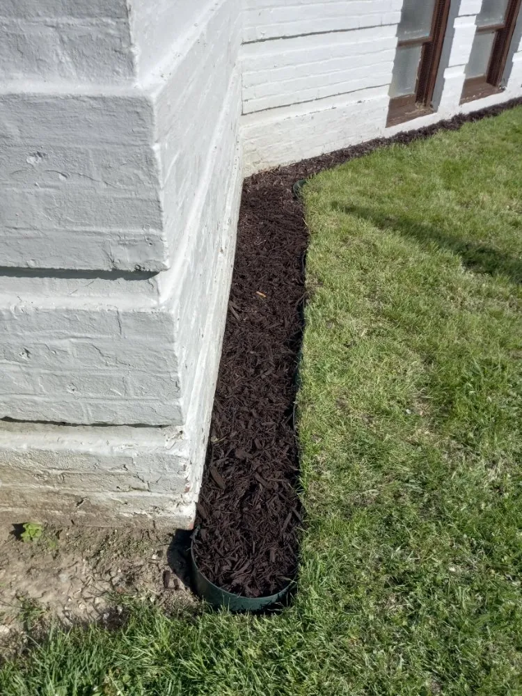 Affordable landscape design for year-round maintenance in Danville, IL by T Real Landscaping