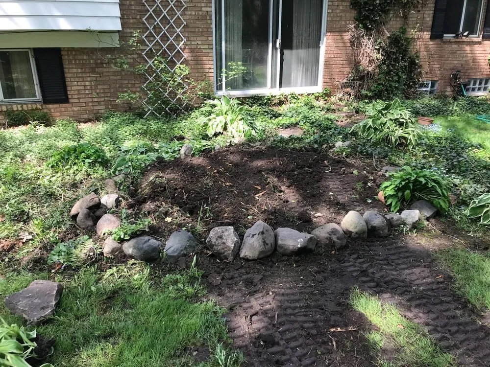Expert yard maintenance for beautiful yards across Waterford, MI - T-Rox Stump Grinding