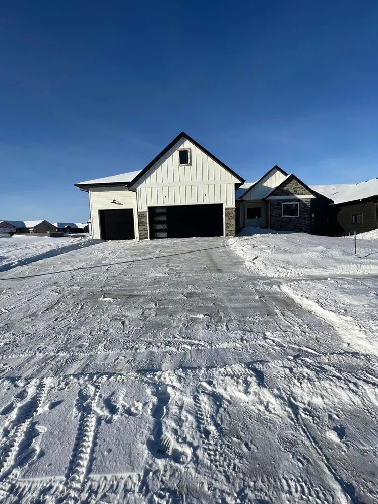 Affordable lawn mowing service with custom design in Sioux Falls, SD by TA Landscaping