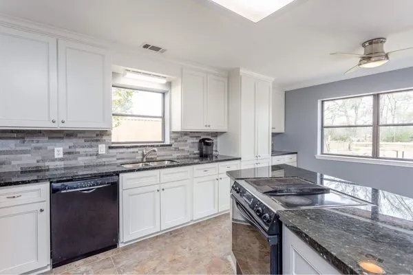 TabbyMac’s Sparkling Service Logo