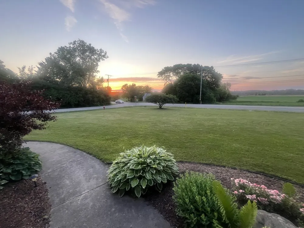 Custom landscape installation with custom design in Milwaukee, WI by Tailormade Lawn Care