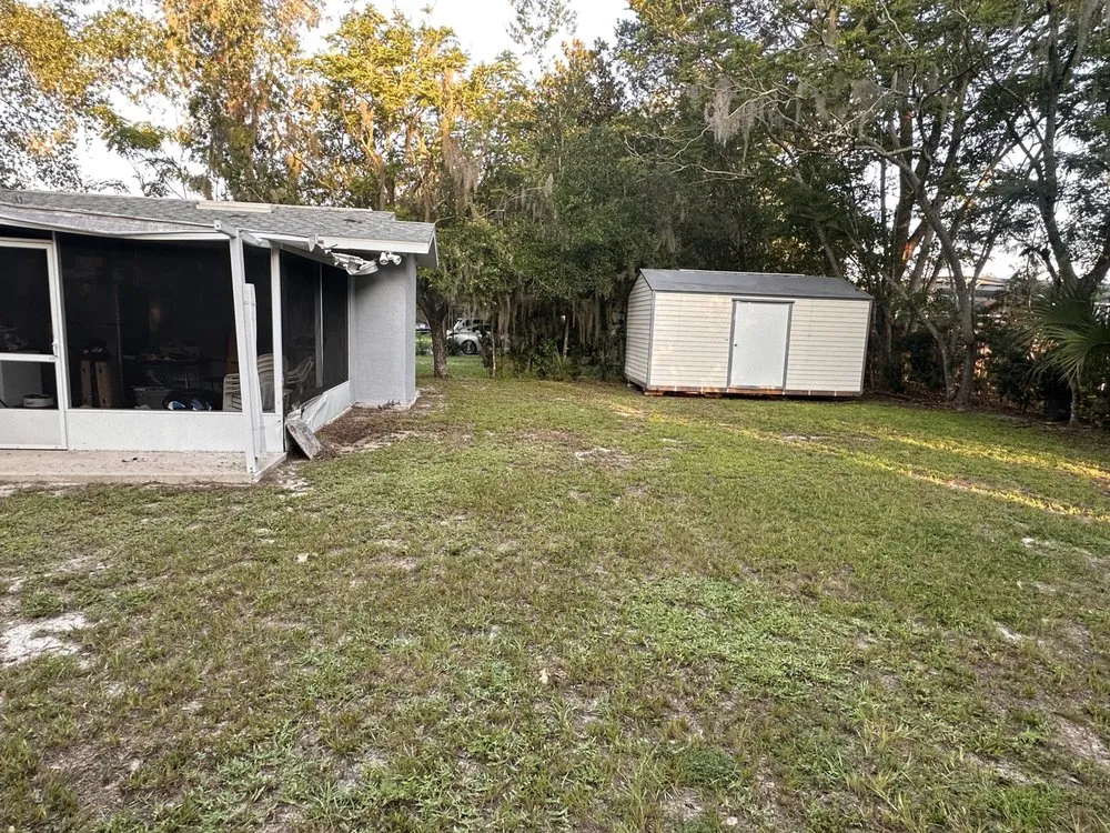 Custom lawn care service for homes in Leesburg, FL by Take care A Lawn Maintenance Company