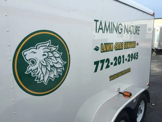 Taming Nature Lawn Care Services Logo