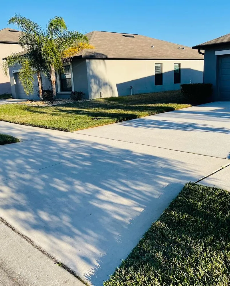 Trusted lawn mowing service for homes in Zephyrhills, FL by Tampa Bama Lawn Service
