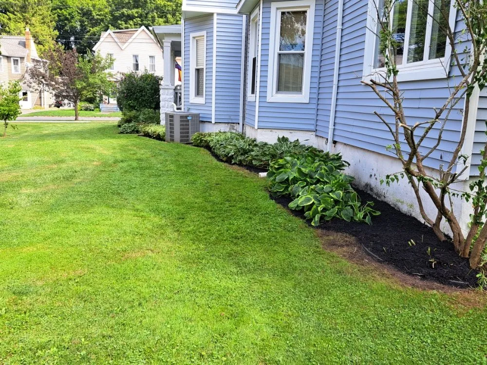 Expert landscape installation for year-round maintenance in Lyons, NY by Tanks Lawn Care & Landscaping