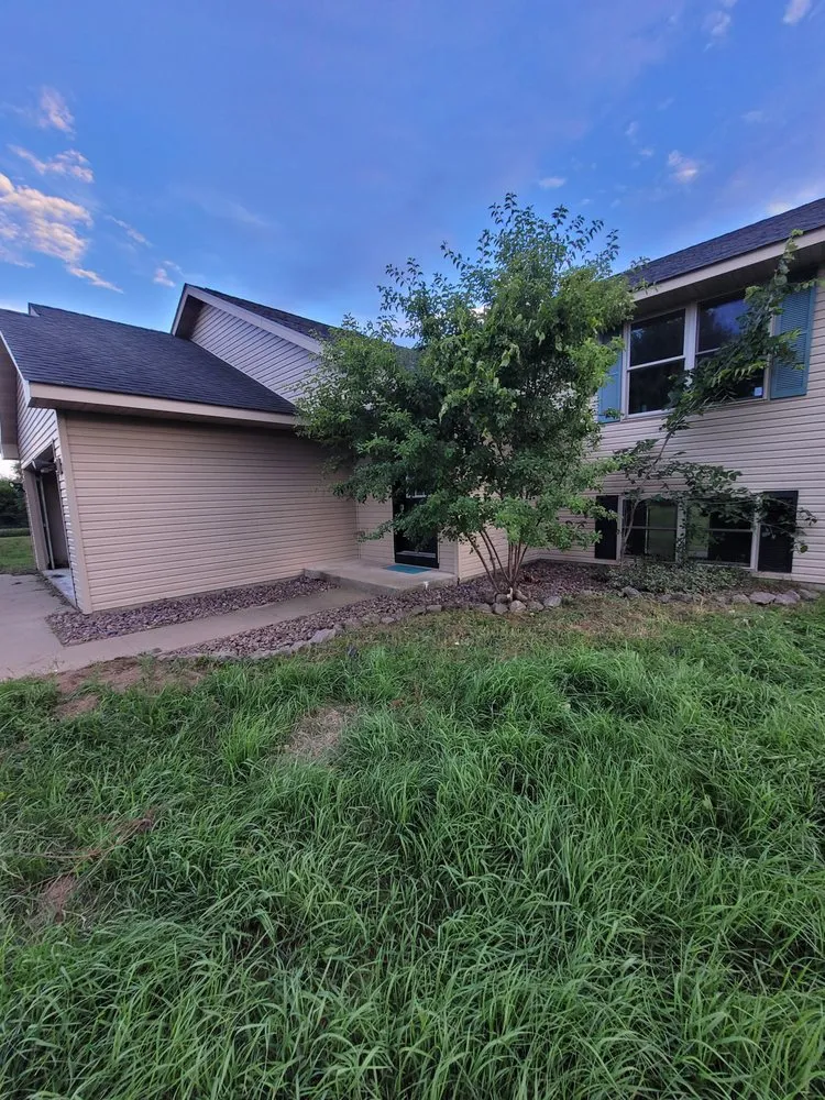 Custom yard cleanup service for year-round maintenance across Hudson, WI - Task Tackler