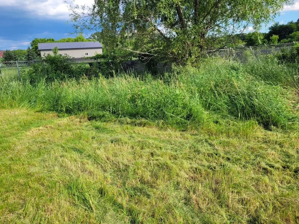 Top-rated landscape installation with custom design in Hudson, WI by Task Tackler