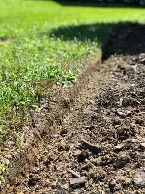 Tate's Lawn Care Logo