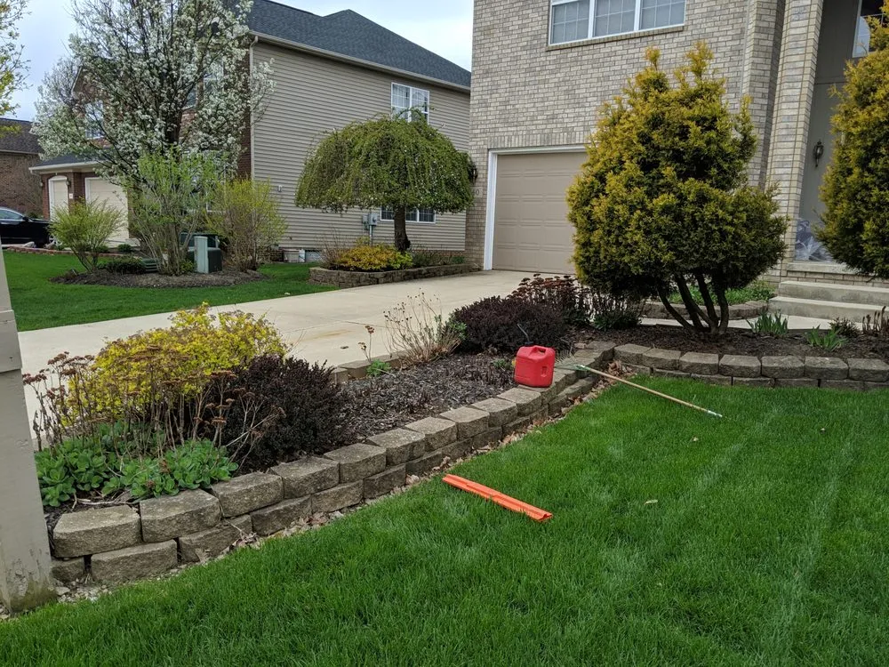 Custom outdoor landscaping with custom design in Parma, OH by Tayeh Landscaping