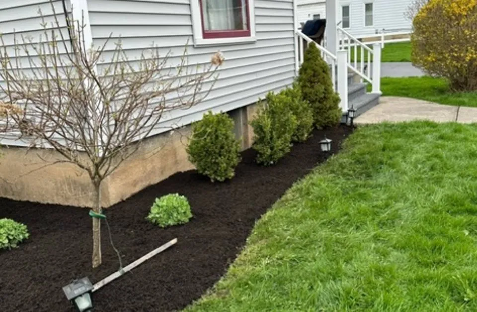Professional garden landscaping for year-round maintenance in Auburn, NY by Taylor Enterprise
