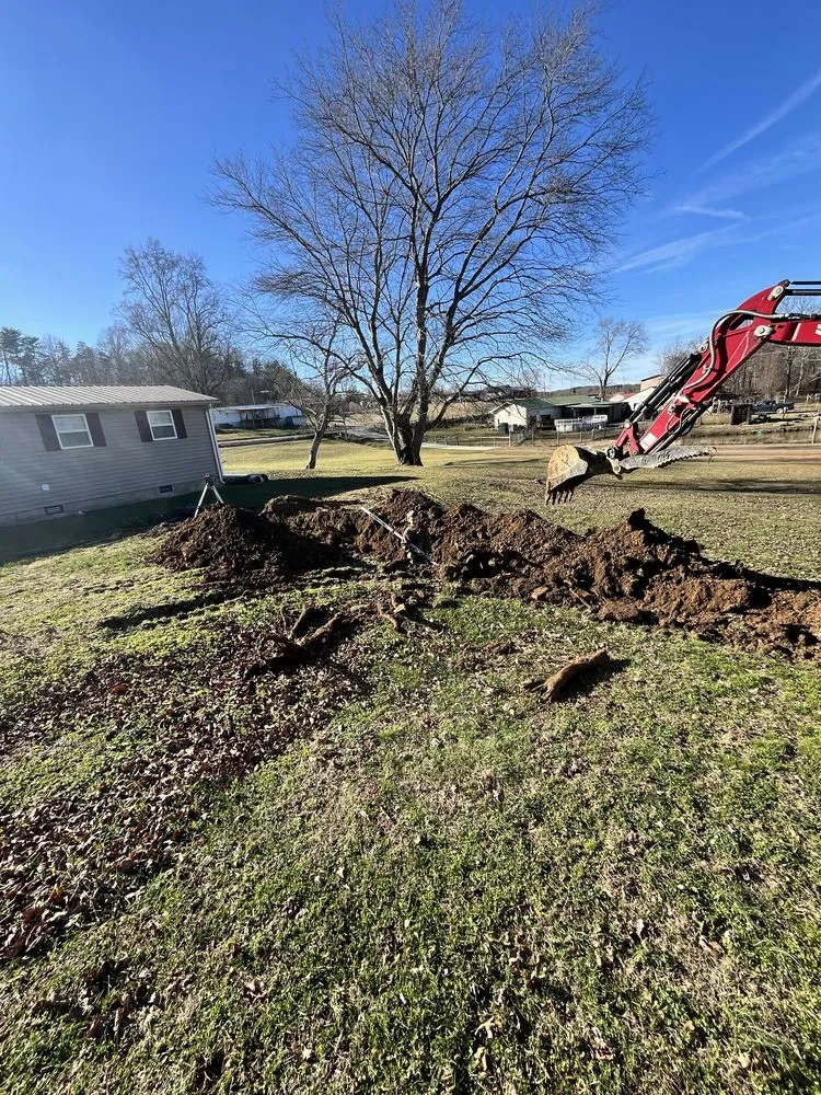 Expert lawn mowing service with custom design in Pikeville, TN by Taylor Excavation & Landscaping