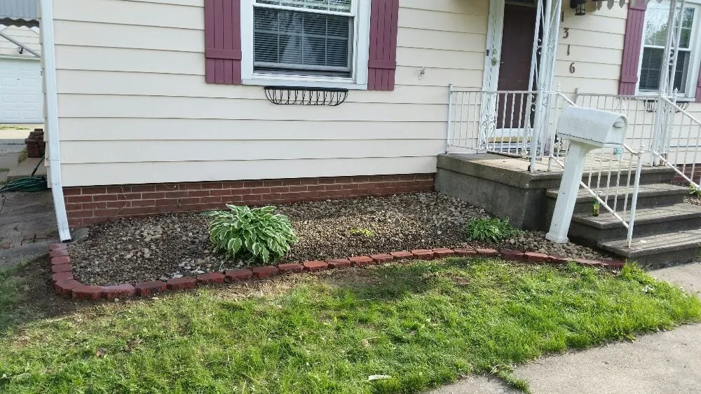Professional yard cleanup service for residential properties across East Peoria, IL - Taylor Landscaping