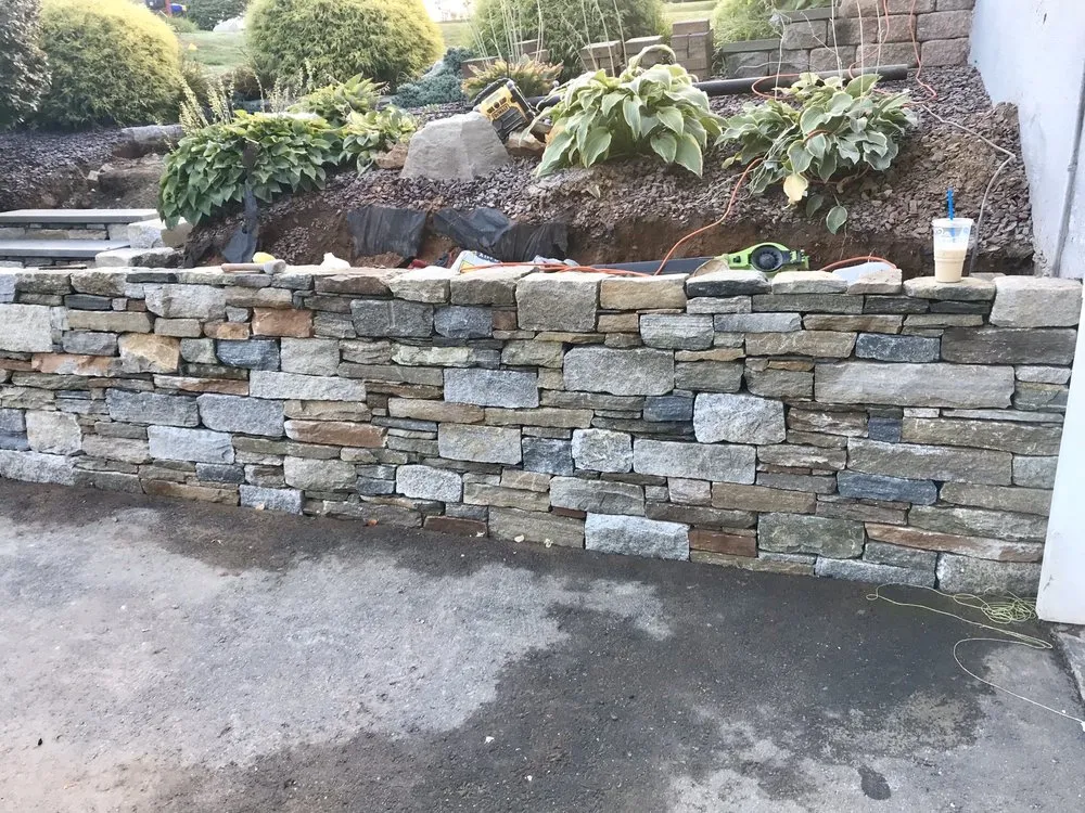 Trusted lawn mowing service for beautiful yards in South Windsor, CT by Taylor Landscaping