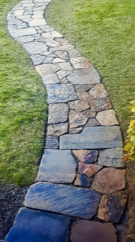 Local landscape installation for year-round maintenance in South Windsor, CT by Taylor Landscaping