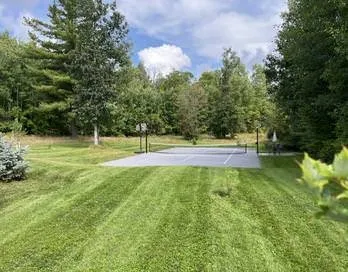 Affordable yard cleanup service for year-round maintenance across St. Cloud, MN - Tbaum Lawn Care