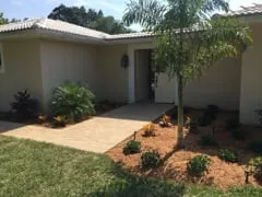 Custom garden landscaping with custom design in Lehigh Acres, FL by TCI Sod & Landscape