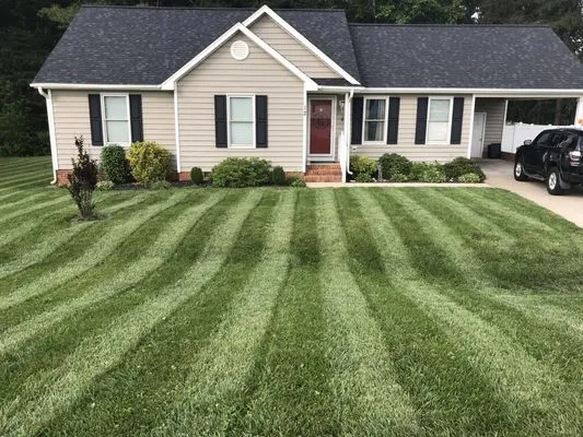 TC’s Lawncare Logo