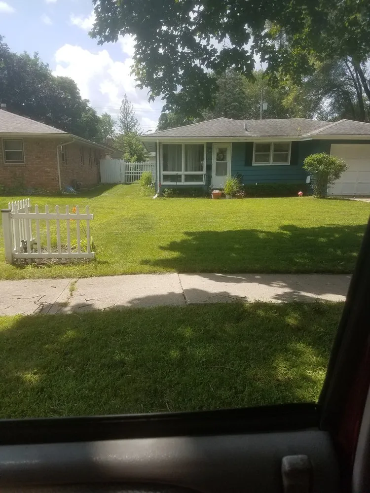 Custom garden landscaping in Rockford, IL by T&D Lawn Services