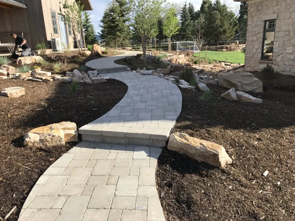 Custom landscape installation for beautiful yards in Sheridan, CO by TDK LANDSCAPING
