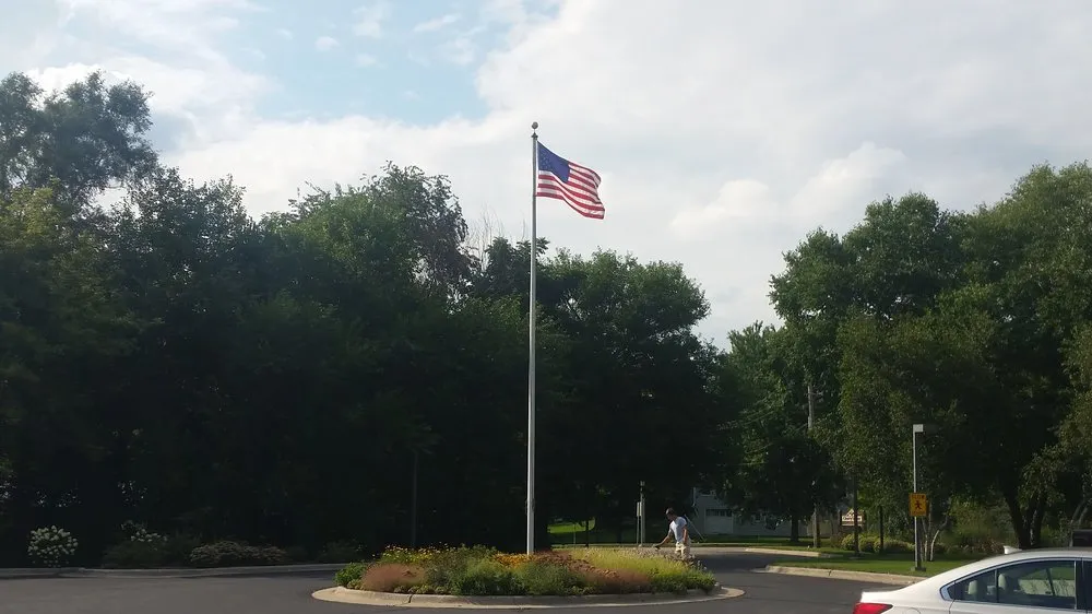 Top-rated lawn care service for beautiful yards across Sycamore, IL - Teach 'em to Fish Landscaping