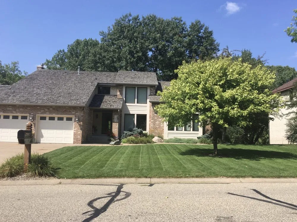 Reliable lawn mowing service for homes across Brooklyn Park, MN - Tedious LLC