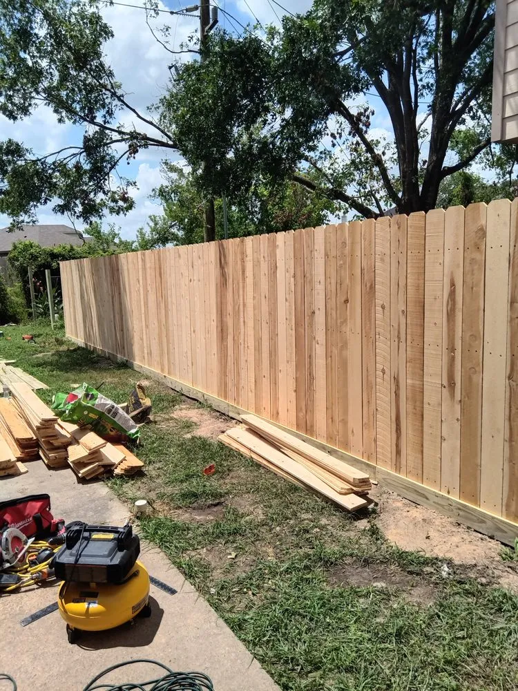 Professional yard cleanup service for year-round maintenance in Houston, TX by Teds Lawn Care