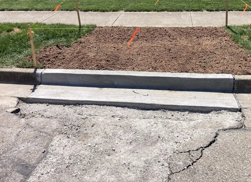 Reliable lawn mowing service for residential properties in Tipp City, OH by Teel Concrete