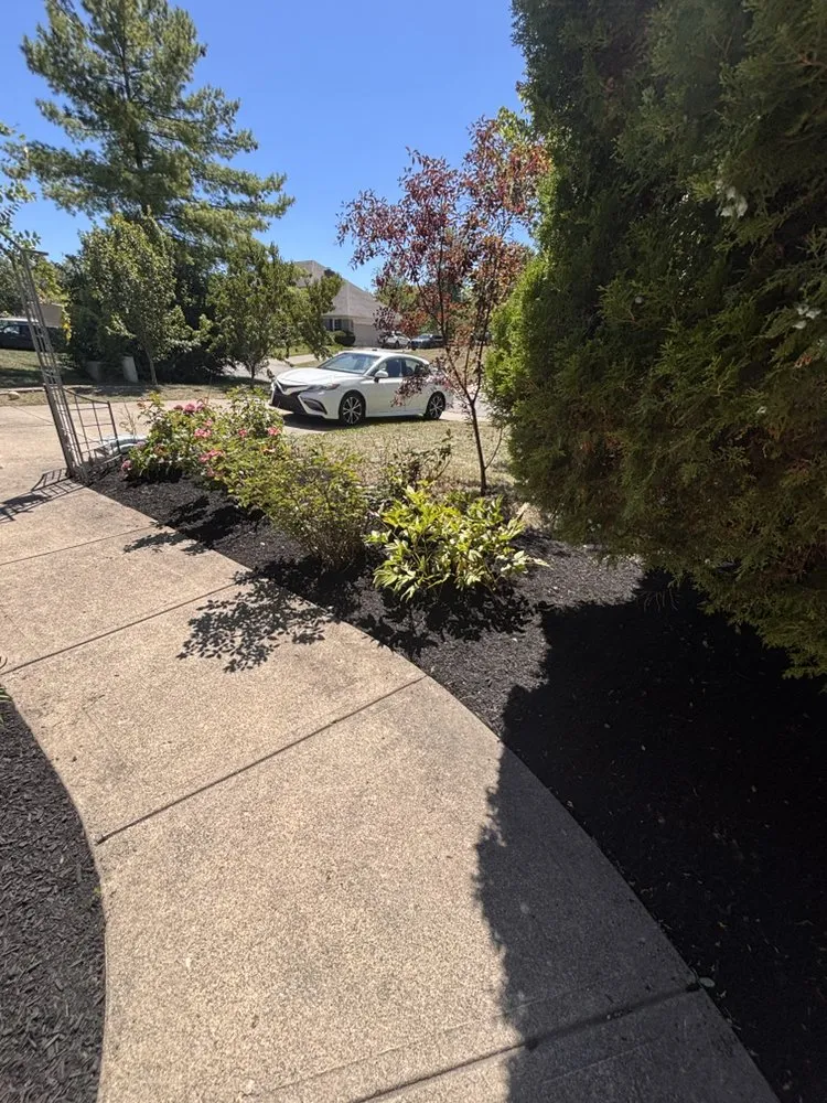 Custom landscape design with custom design in West Chester, OH by Tello Trejo Landscaping