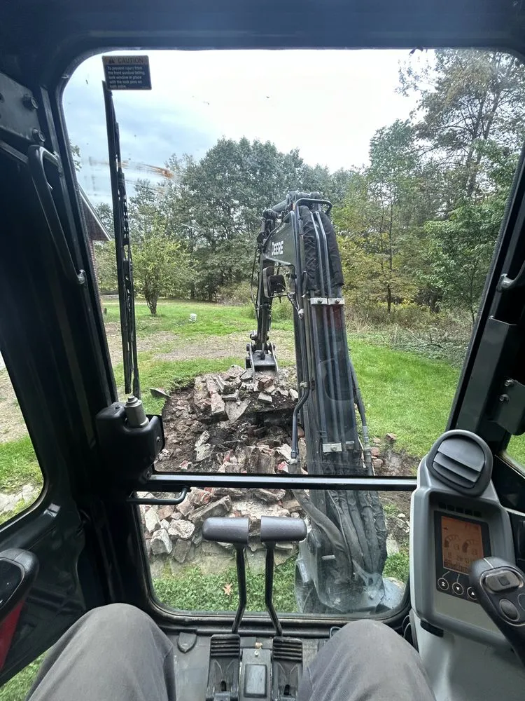 Professional yard maintenance for year-round maintenance in Dalton, PA by Tench Excavation