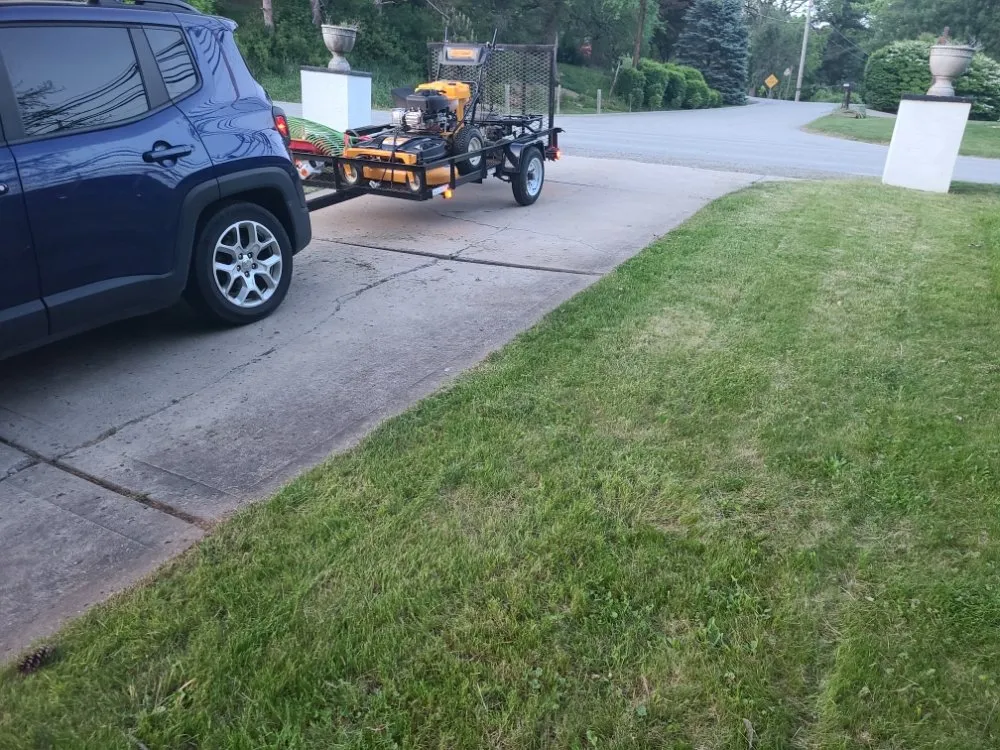 Professional yard maintenance experts serving Pittsburgh, PA - Tender Loving Lawn Care Services