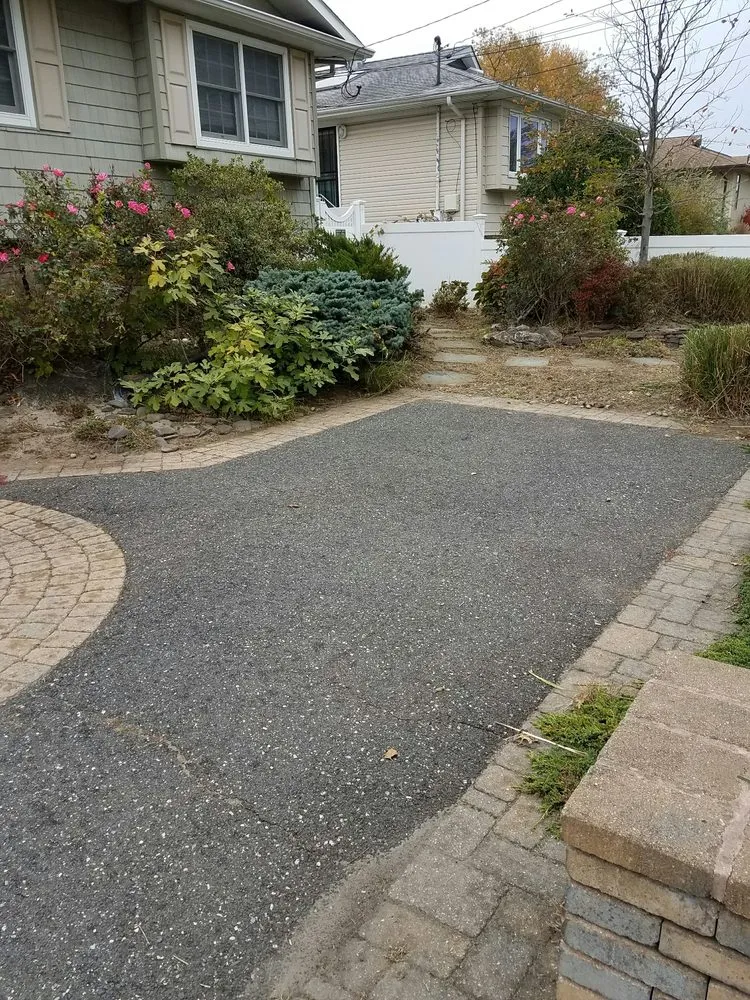 Trusted lawn care service for year-round maintenance in Queens, NY by Tennant Lawn Care