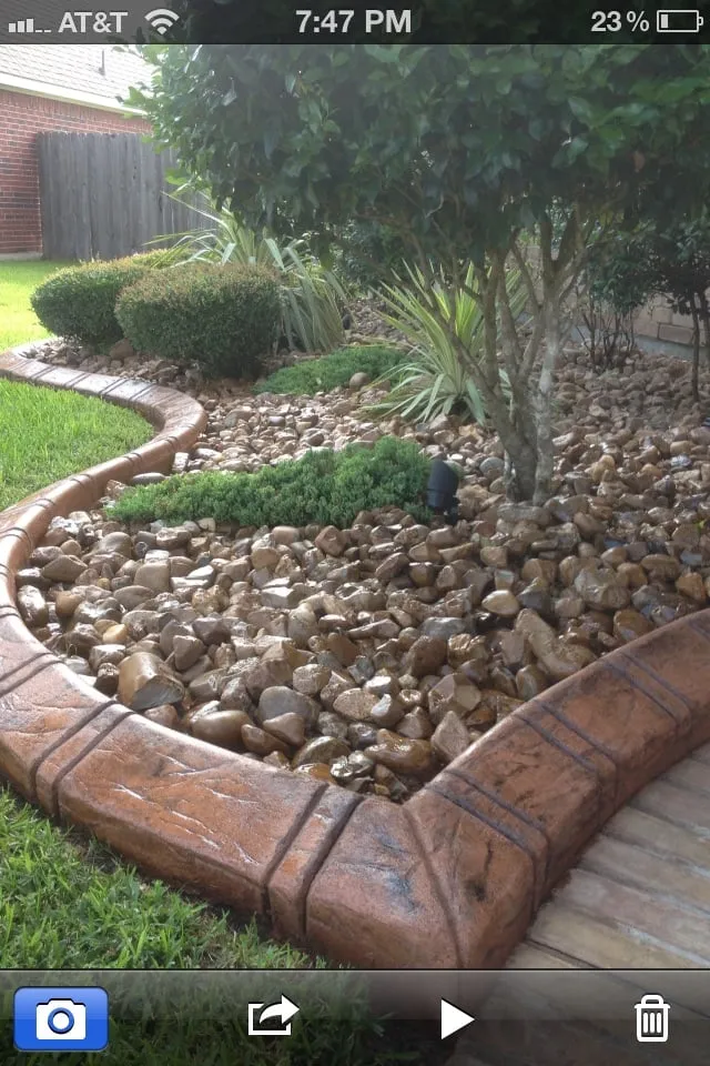 Expert lawn mowing service for residential properties in Houston, TX by Texas Curb n Borders