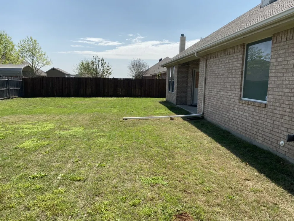 Affordable lawn mowing service for year-round maintenance in Godley, TX by Texas Lawn Cuttin