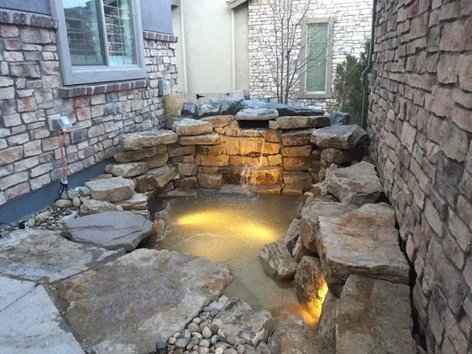 Texas pond & waterfall Logo