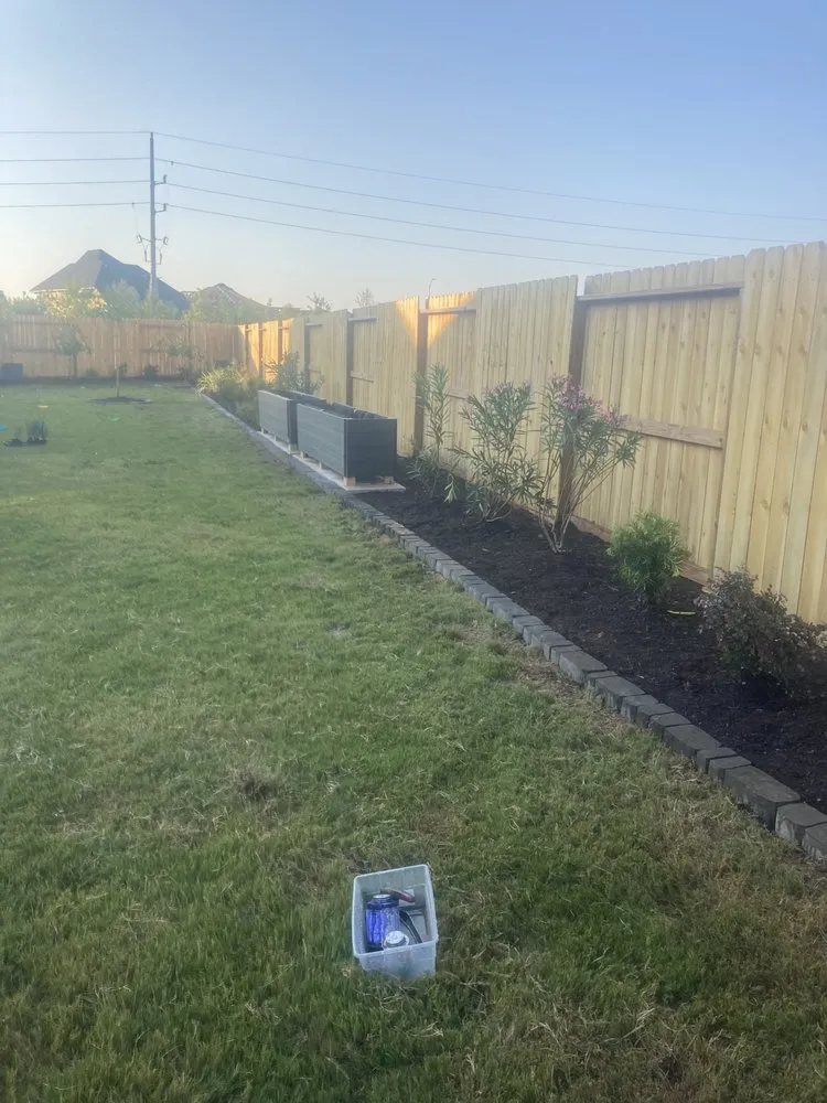 Professional yard cleanup service for residential properties in Houston, TX by Texas Vines Landscape