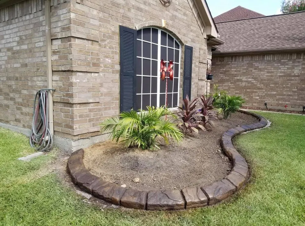 Affordable lawn mowing service in Pflugerville, TX by TexStar Curb & Borders