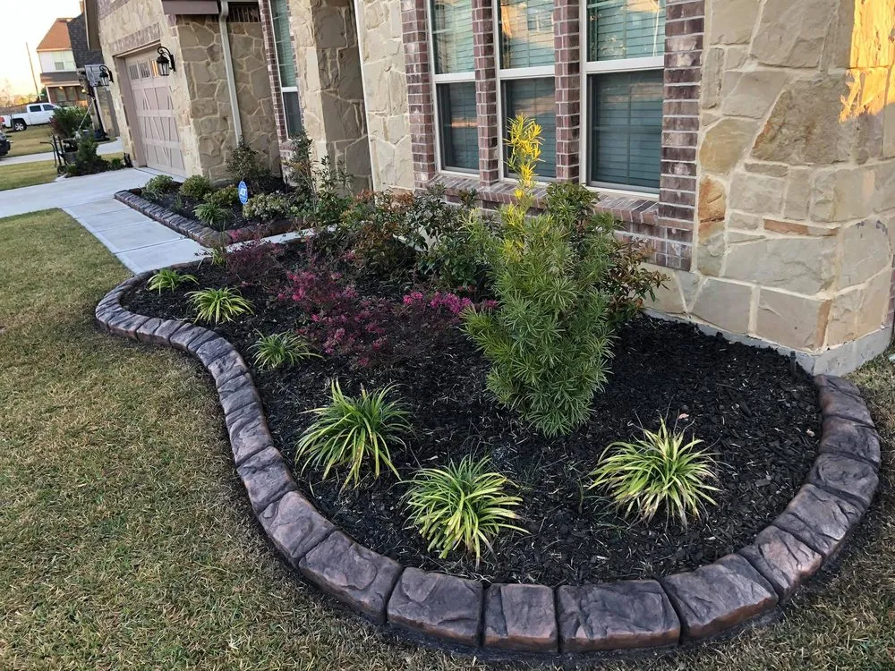 Professional residential landscaping in Pflugerville, TX by TexStar Curb & Borders