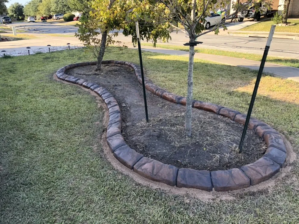 Reliable yard cleanup service experts serving Pflugerville, TX - TexStar Curb & Borders