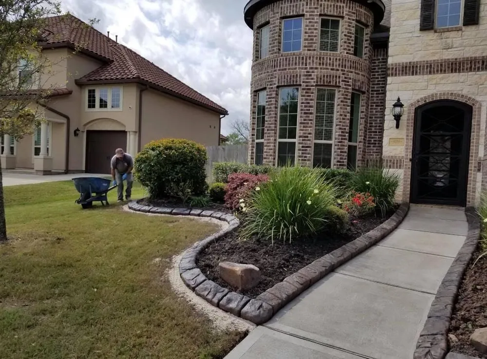 Top-rated lawn mowing service in Pflugerville, TX by TexStar Curb & Borders