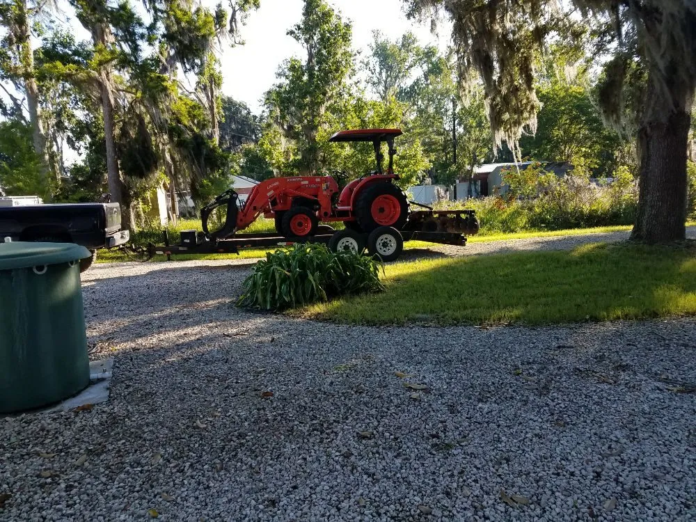 Professional lawn care service for residential properties across St. Augustine, FL - That Girl Lawn Care & Landscaping Design