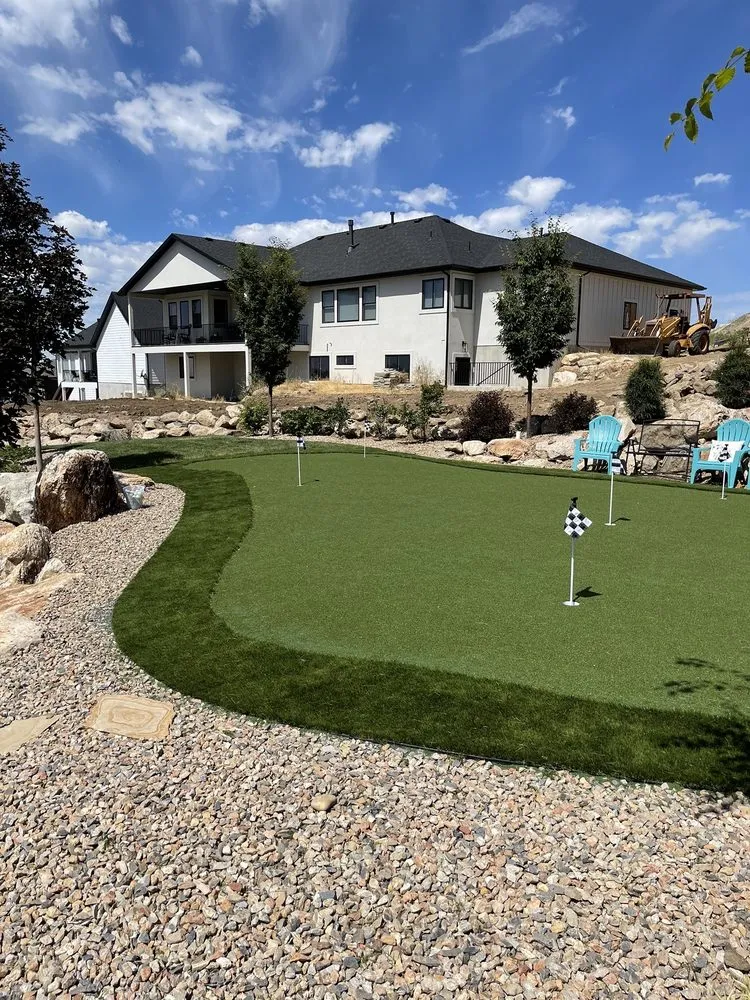 Custom yard cleanup service with custom design in Layton, UT by Thats Turf