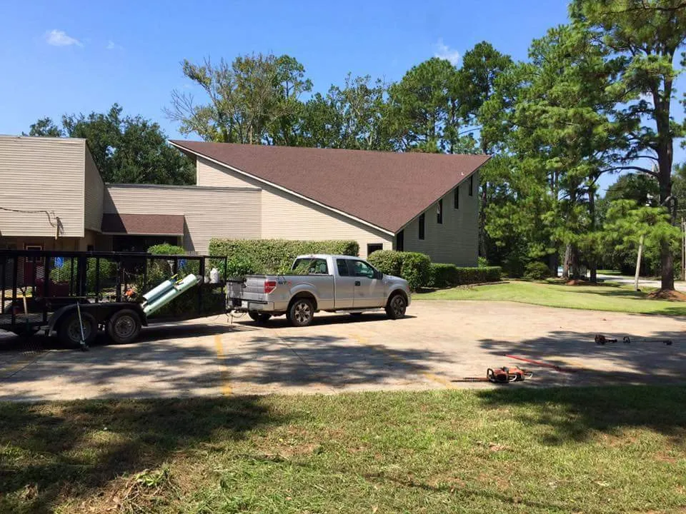 Professional landscape installation for residential properties in Groves, TX by The 409 Mowers